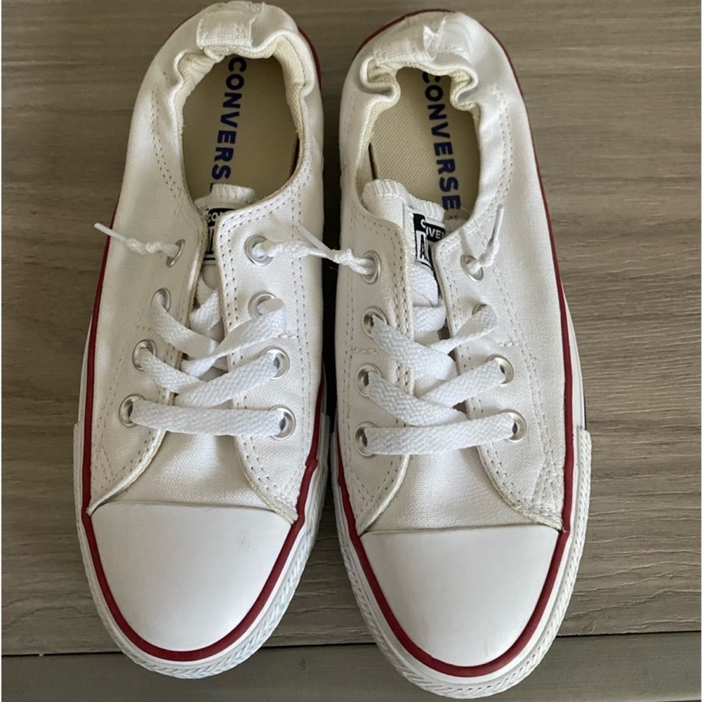 Slightly worn womens White slip on converse
